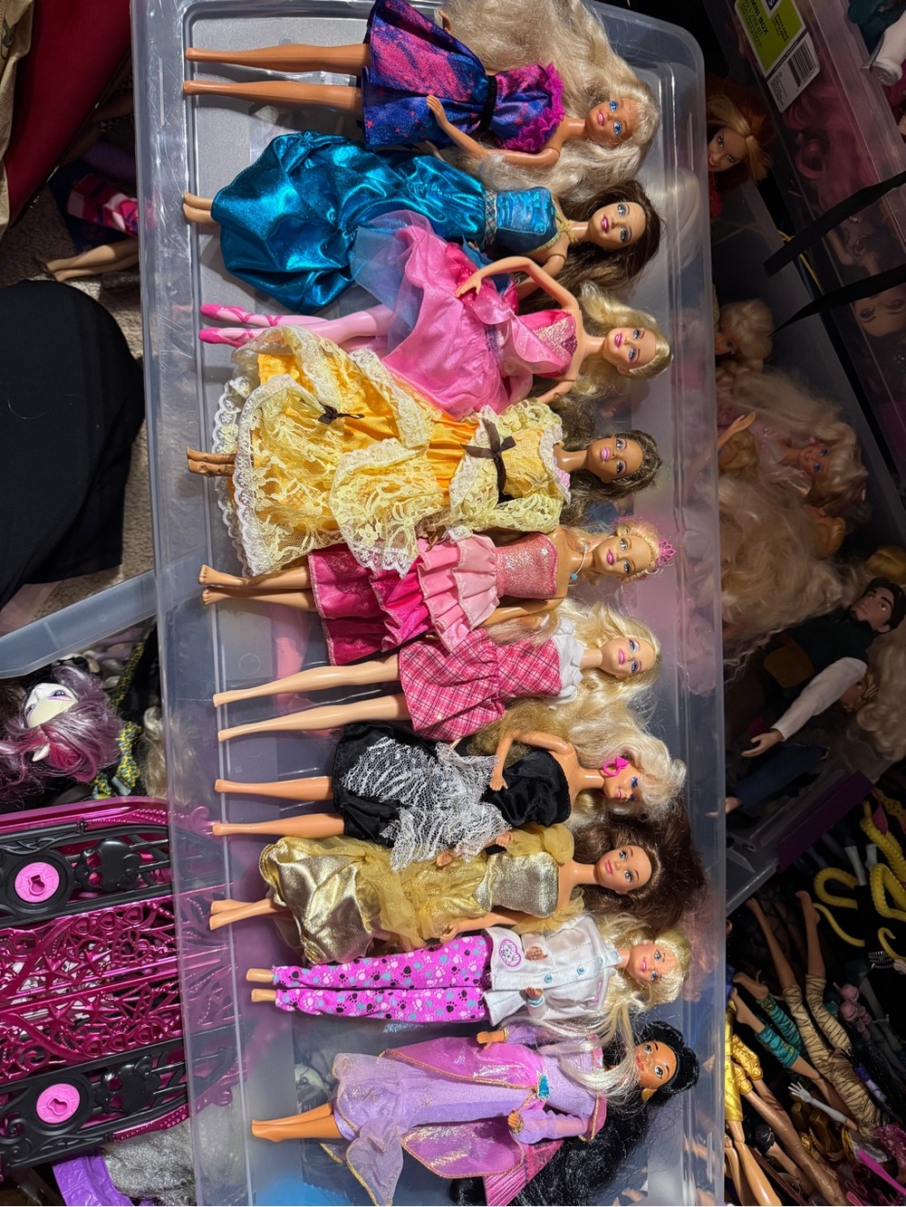 Barbie Dolls lot with Assortment in Pink, Purple, Blue, Yellow, Gold, Black